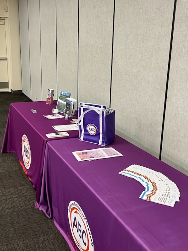 ABC SCW Alliance of Busiuness and Community display table